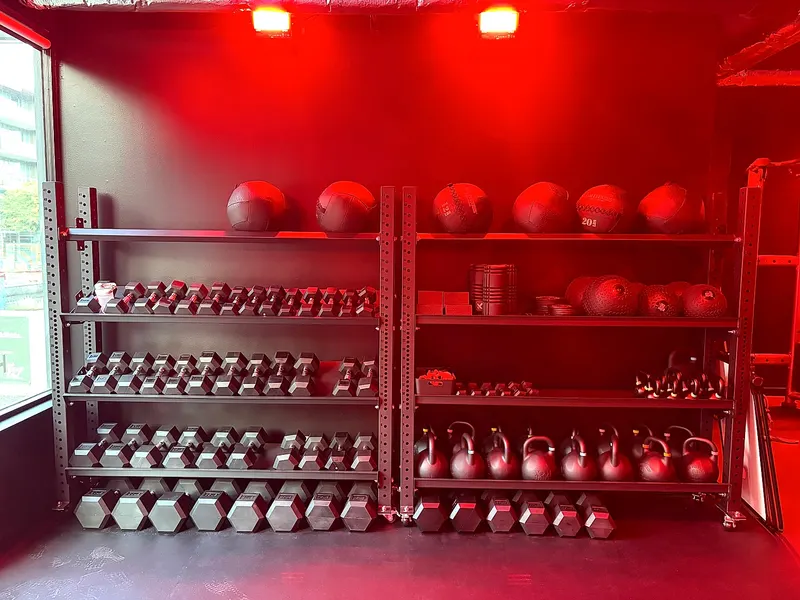 Dumbbell and medicine ball racks used in small group training sessions in North Vancouver