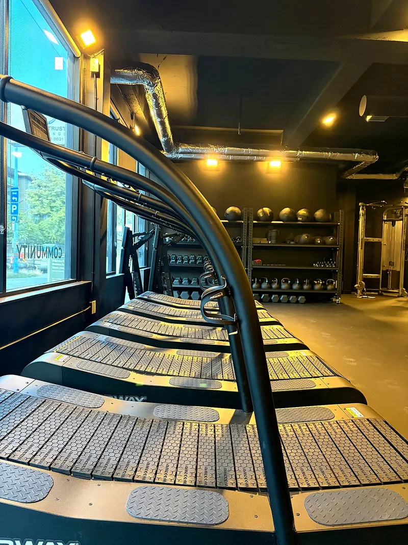 Row of treadmills for interval training at the Coresa studio in Lower Lonsdale